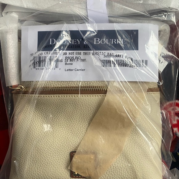 BONE COLOR Dooney and Burke Pebble Grain Letter Carrier in Bone color brand new - Picture 3 of 4